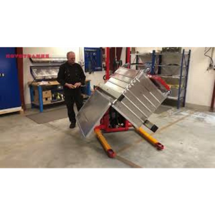 Acélkonténerek forgatása elektromos Logitrans forgatóval